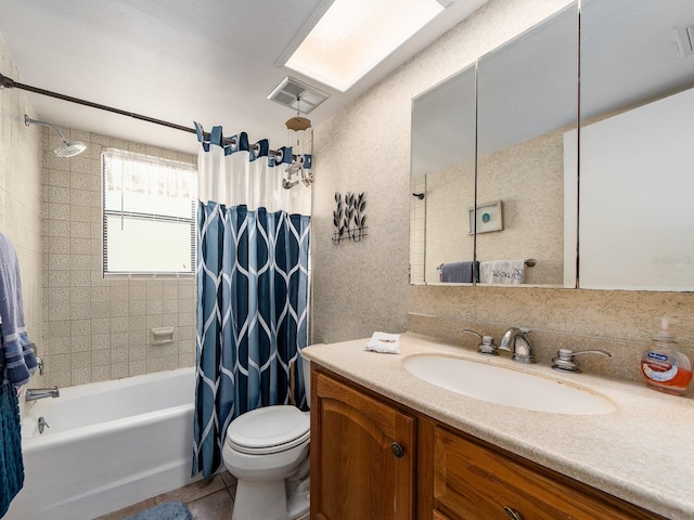 2555 Royal Pines Cir Unit A, Clearwater, FL 33763 - full bath with vanity, shower / tub combo, a skylight, and tile patterned flooring