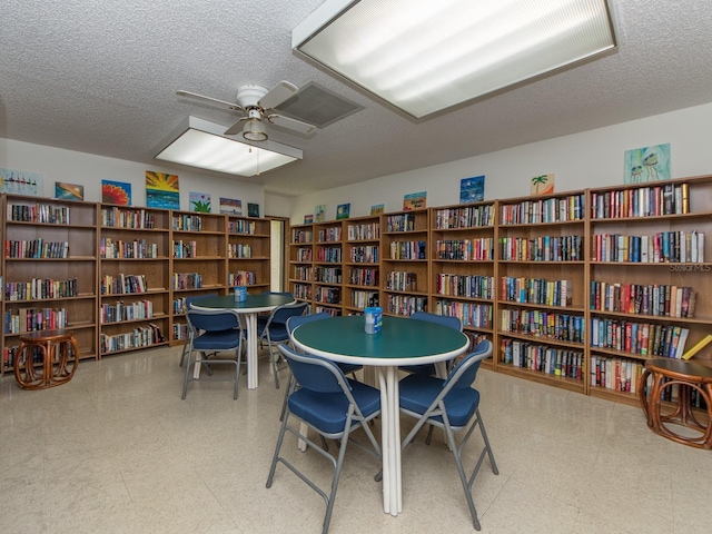 2555 Royal Pines Cir Unit A, Clearwater, FL 33763 - game room featuring a textured ceiling, tile patterned floors, and ceiling fan