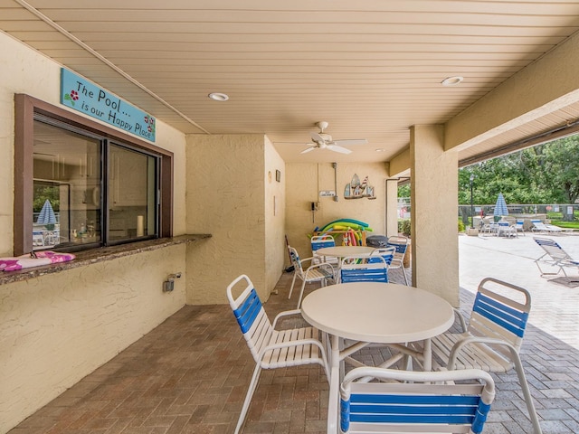 2555 Royal Pines Cir Unit A, Clearwater, FL 33763 - view of patio / terrace with outdoor dining space and ceiling fan