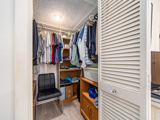 2555 Royal Pines Cir Unit A, Clearwater, FL 33763 - walk in closet featuring wood finished floors