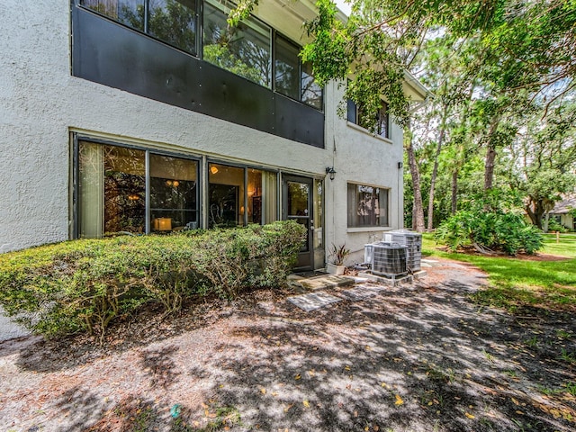 2555 Royal Pines Cir Unit A, Clearwater, FL 33763 - back of house with stucco siding