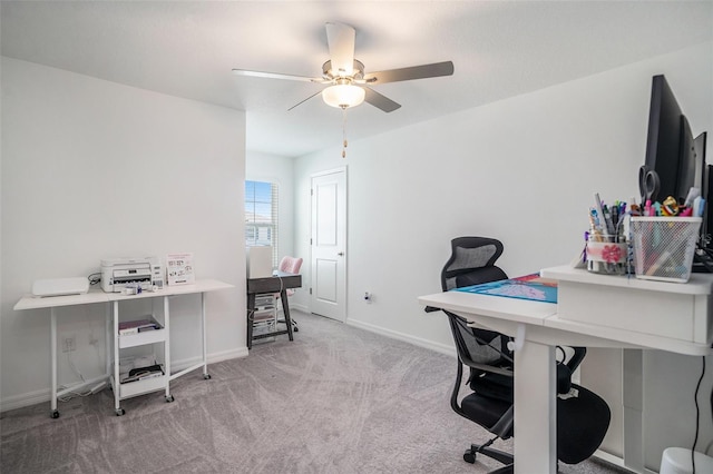 home office with baseboards, carpet floors, and ceiling fan