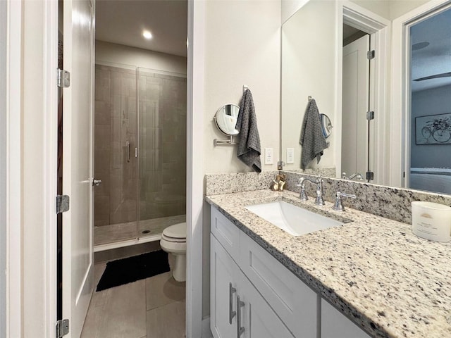 946 Highland Ave Unit 47, Dunedin, FL 34698 - full bathroom with a shower stall, tile patterned floors, vanity, toilet, and recessed lighting