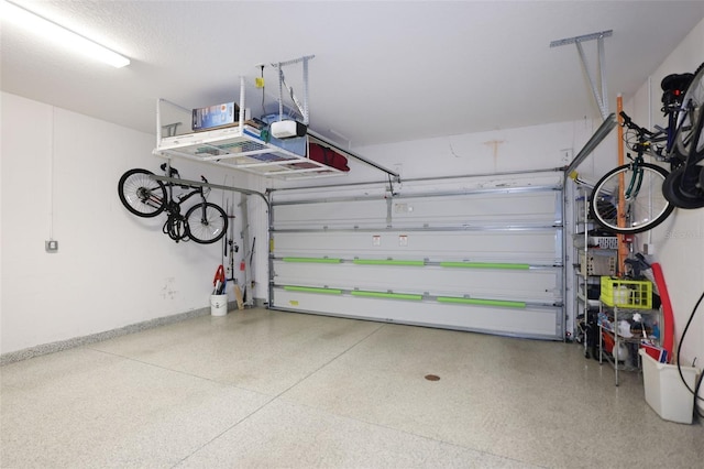 946 Highland Ave Unit 47, Dunedin, FL 34698 - garage featuring a garage door opener
