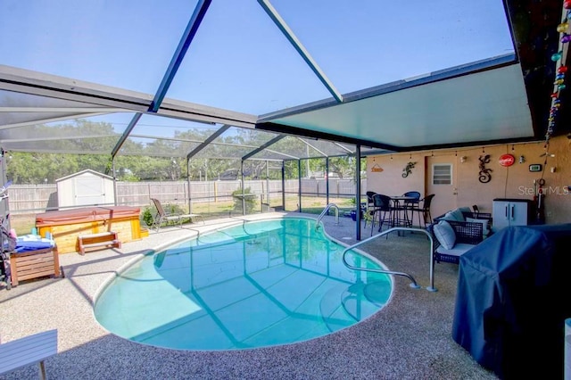 10833 96th St N, Largo, FL 33773 - view of pool featuring a shed, a fenced backyard, and a patio