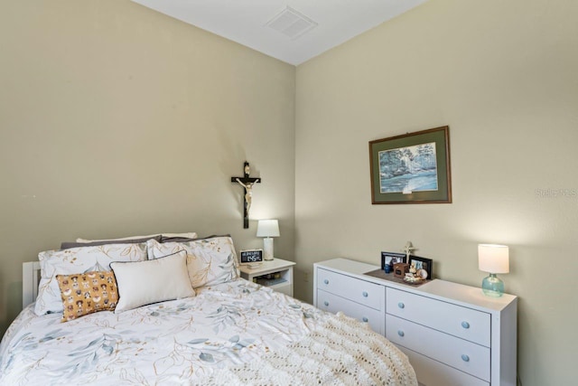 bedroom with visible vents