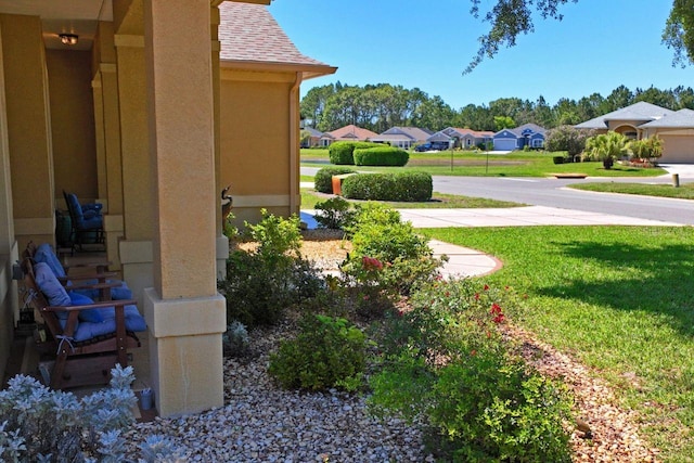 view of yard with a residential view