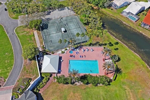 birds eye view of property featuring a water view