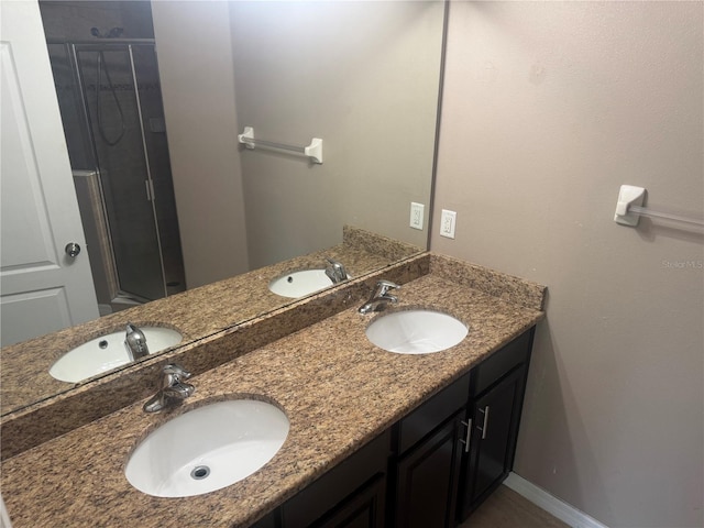 778 Spring Flowers Trl, Brandon, FL 33511 - bathroom with a stall shower, double vanity, and a sink