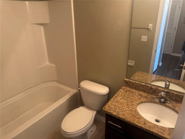 778 Spring Flowers Trl, Brandon, FL 33511 - full bathroom featuring baseboards, toilet,  shower combination, and vanity