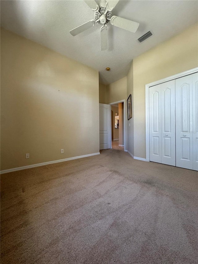 446 Noble Faire Dr, Sun City Center, FL 33573 - unfurnished bedroom with carpet flooring, a closet, visible vents, and baseboards