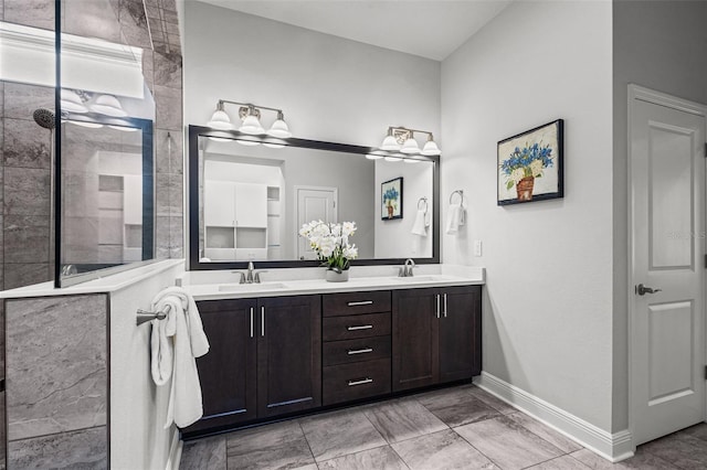 15329 Renaissance Ave, Odessa, FL 33556 - bathroom featuring baseboards, a sink, a walk in shower, and double vanity