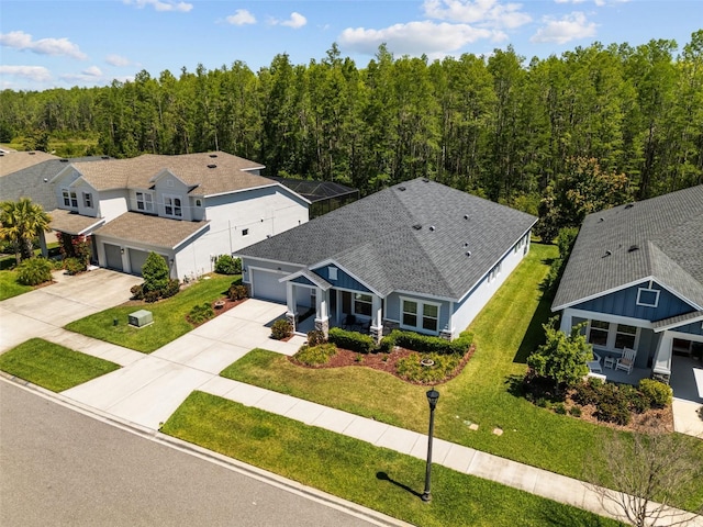 15329 Renaissance Ave, Odessa, FL 33556 - birds eye view of property featuring a view of trees