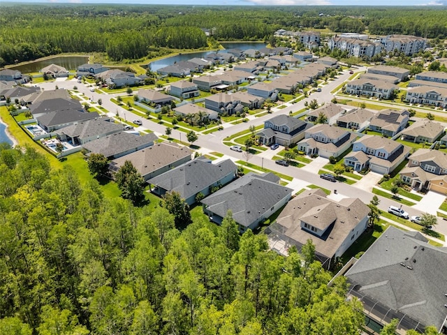 15329 Renaissance Ave, Odessa, FL 33556 - birds eye view of property featuring a residential view, a forest view, and a water view