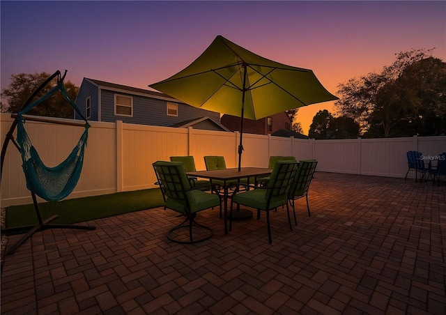 16819 Stanza Ct, Tampa, FL 33624 - view of patio / terrace with outdoor dining area and a fenced backyard