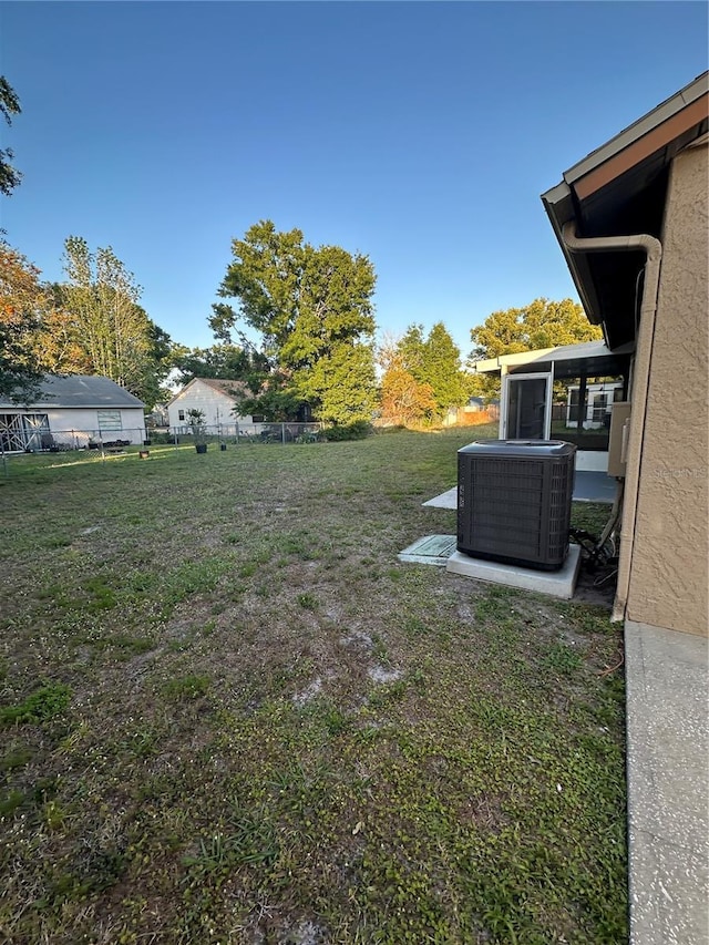 7601 Como Dr, New Port Richey, FL 34655 - view of yard with central AC and fence