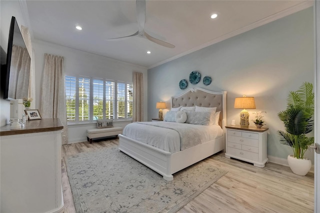 bedroom featuring light wood-style flooring, baseboards, recessed lighting, and crown molding