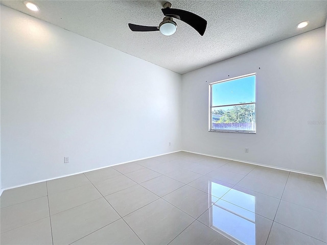 11535 Wellman Dr, Riverview, FL 33578 - tiled spare room featuring a ceiling fan, baseboards, a textured ceiling, and recessed lighting