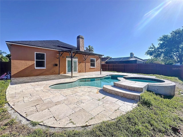 11535 Wellman Dr, Riverview, FL 33578 - view of pool with a patio area, a pool with connected hot tub, and a fenced backyard
