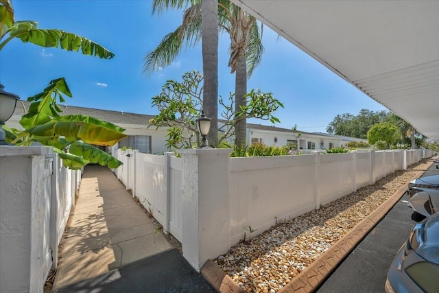 view of side of property with fence