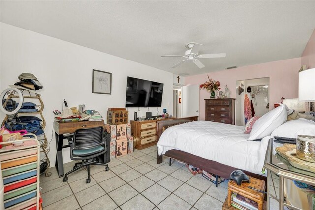bedroom with light tile patterned flooring and ceiling fan