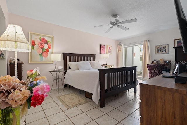 1655 S Highland Ave Unit C155, Largo, FL 33756 - bedroom with light tile patterned floors, access to outside, and ceiling fan