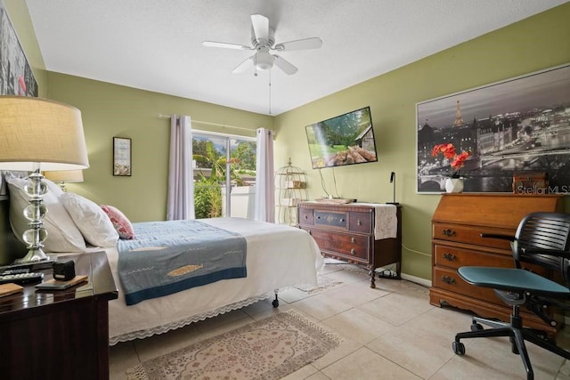 1655 S Highland Ave Unit C155, Largo, FL 33756 - bedroom featuring light tile patterned floors, a ceiling fan, and baseboards
