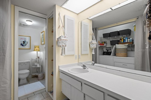 1655 S Highland Ave Unit C155, Largo, FL 33756 - bathroom with toilet, tile patterned floors, and vanity