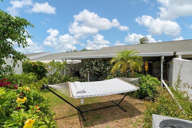 1655 S Highland Ave Unit C155, Largo, FL 33756 - back of house with central AC unit