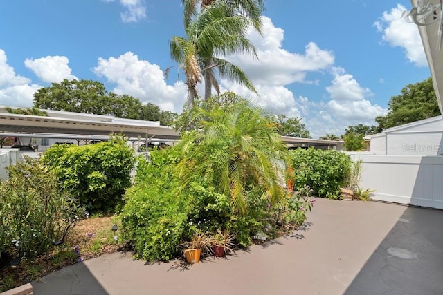 1655 S Highland Ave Unit C155, Largo, FL 33756 - view of patio / terrace featuring fence