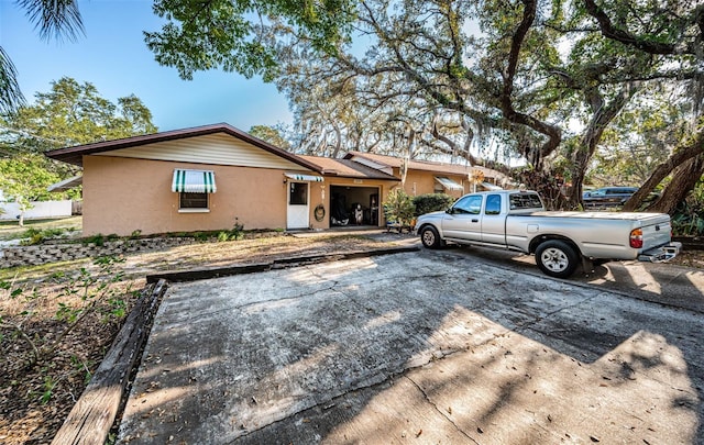 618 July Dr, Tarpon Springs, FL 34689 - ranch-style home featuring stucco siding