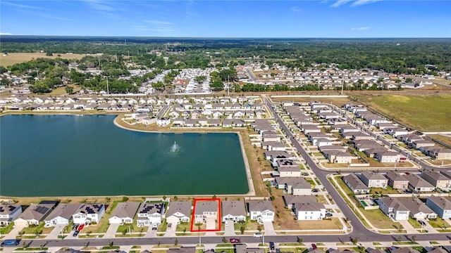 bird's eye view with a residential view and a water view