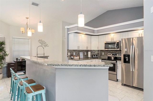 kitchen with stainless steel appliances, visible vents, backsplash, marble finish floor, and light stone countertops
