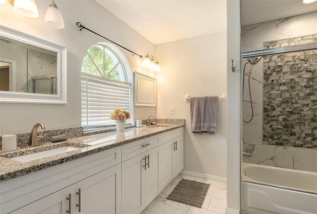 bathroom with combined bath / shower with glass door, baseboards, marble finish floor, and a sink
