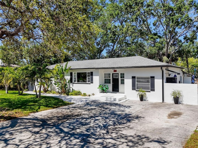 1600 Pasadena Dr, Dunedin, FL 34698 - single story home featuring driveway and stucco siding