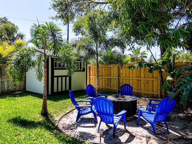 1600 Pasadena Dr, Dunedin, FL 34698 - view of yard with a fire pit