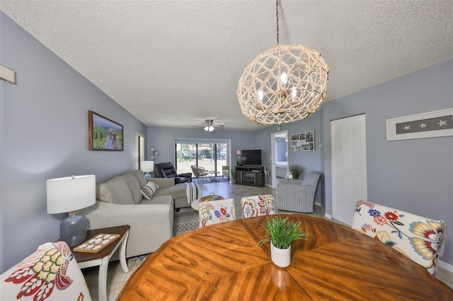 319 Kelsey Way, Sun City Center, FL 33573 - dining room featuring a textured ceiling and ceiling fan