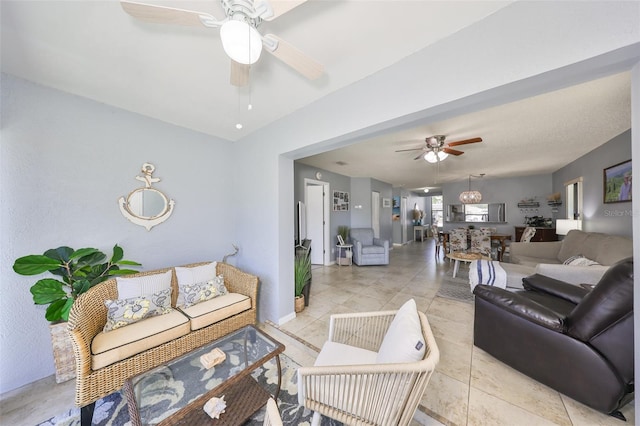 319 Kelsey Way, Sun City Center, FL 33573 - living area with a ceiling fan and baseboards