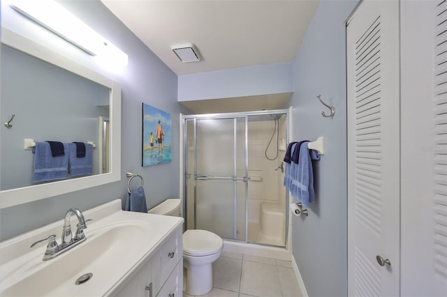 319 Kelsey Way, Sun City Center, FL 33573 - full bath with tile patterned flooring, a shower stall, toilet, and vanity