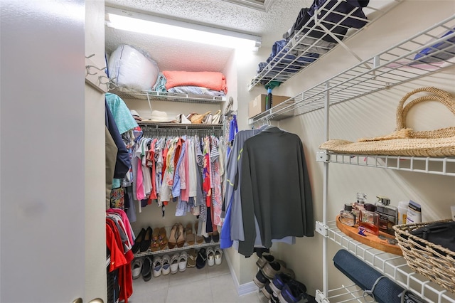 319 Kelsey Way, Sun City Center, FL 33573 - spacious closet with tile patterned floors