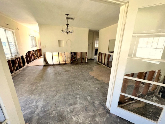 318 Banana St, Tarpon Springs, FL 34689 - unfurnished living room featuring visible vents