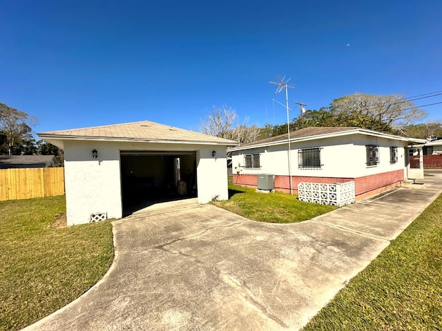 318 Banana St, Tarpon Springs, FL 34689 - view of front of home with an outbuilding, fence, cooling unit, concrete driveway, and a front yard