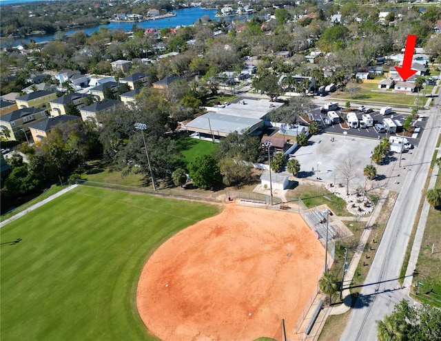 318 Banana St, Tarpon Springs, FL 34689 - drone / aerial view featuring a water view and a residential view