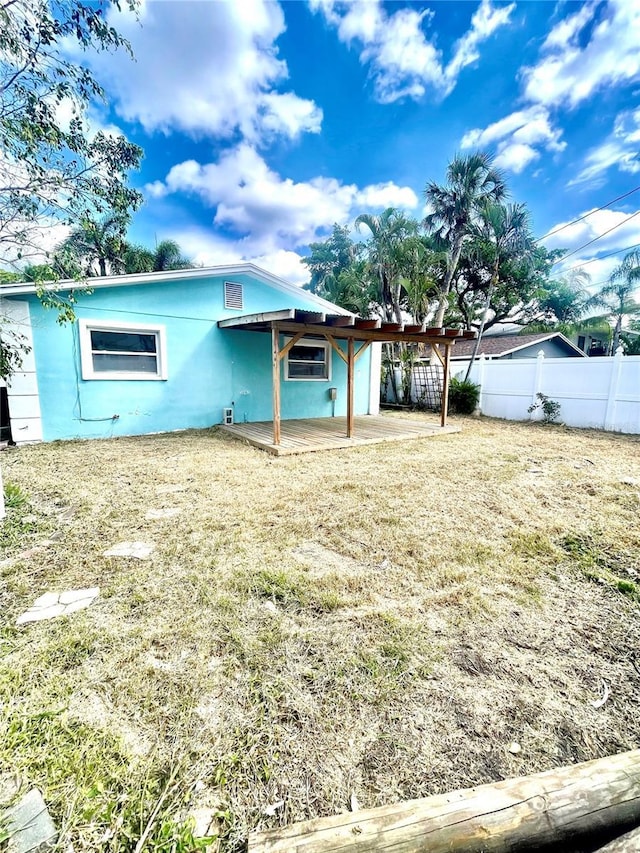 exterior space with a patio area and fence
