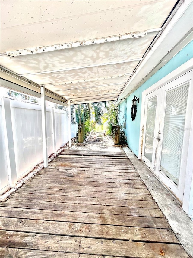 wooden deck with fence and french doors