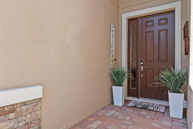 10514 Scenic Hollow Dr, Riverview, FL 33578 - view of exterior entry featuring stucco siding