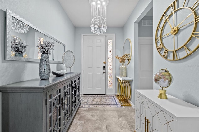 10514 Scenic Hollow Dr, Riverview, FL 33578 - foyer entrance featuring a chandelier and baseboards