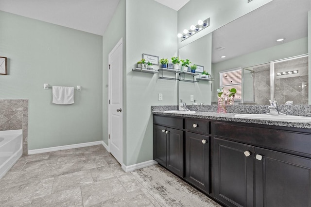 10514 Scenic Hollow Dr, Riverview, FL 33578 - bathroom with baseboards, a garden tub, double vanity, and a tile shower