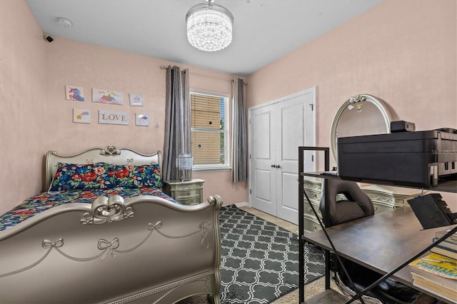 10514 Scenic Hollow Dr, Riverview, FL 33578 - bedroom with a desk and a chandelier
