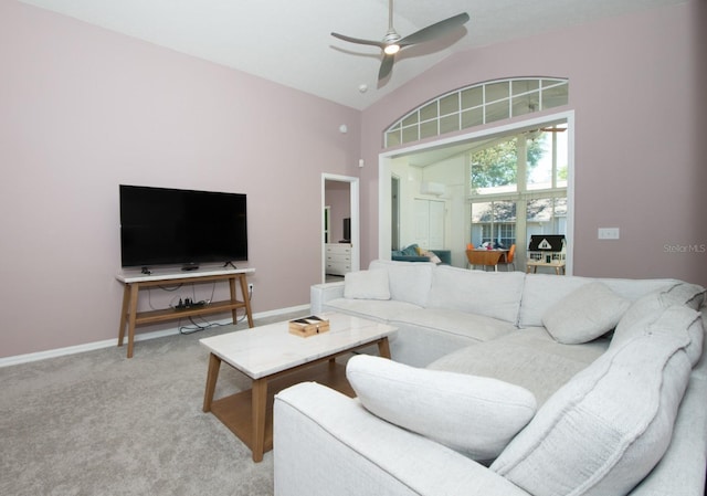 10321 Ravines Dr, New Port Richey, FL 34654 - living area with vaulted ceiling, a ceiling fan, light carpet, and baseboards